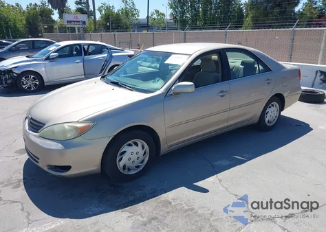 2002 Toyota Camry Le из США, поврежденный, VIN JTDBE30K520119789
